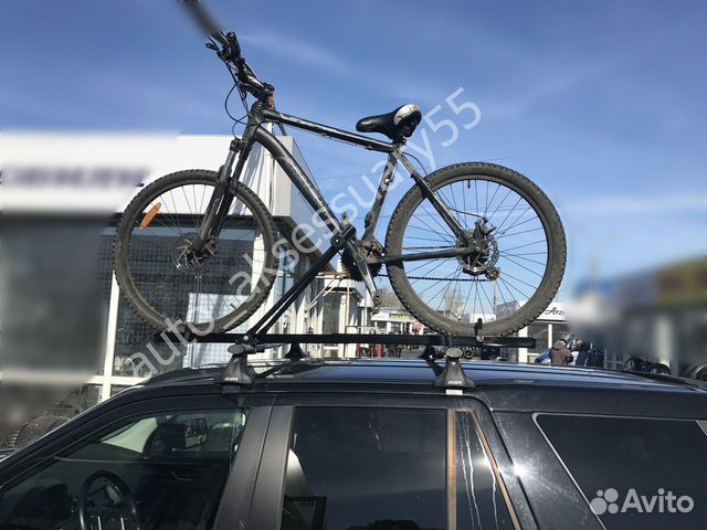 Велокрепление на крышу автомобиля