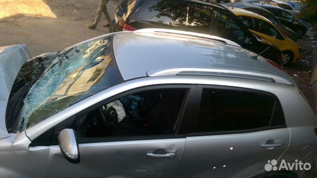 Бампер задний Нью Актион серебро б. у