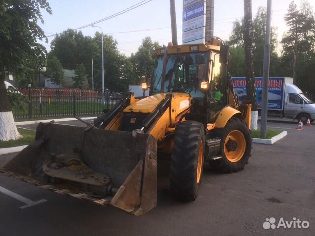 Аренда экскаватора погрузчика с гидромолотом Аренда экскаватора погрузчика с гидромолотом