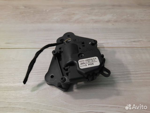 Моторчик заслонки отопителя Ford