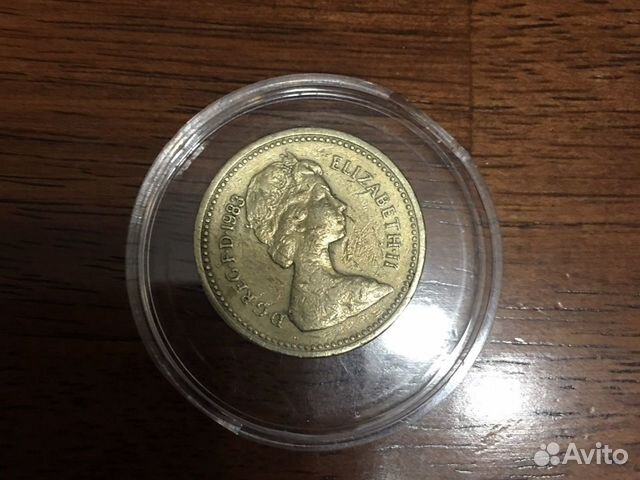 Великобритания 1 фунт 1983 года перевертыш