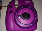 Фиолетовый фотоаппарат