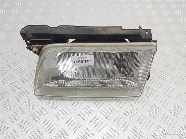 Фара левая Opel Kadett E