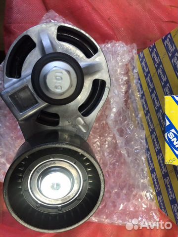 Ролик с натяжителем приводного ремня