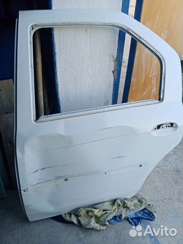 Дверь левая задняя Renault logan