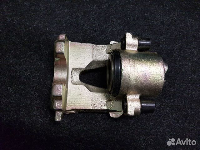 Суппорт тормозной L 1K0615123A VW Golf 5.Octavia