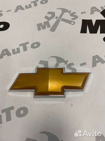 Знак решётки радиатора нива шевроле жёлтый