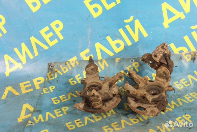 Поворотный кулак Nissan Primera P10