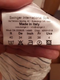 Белый брючный костюм