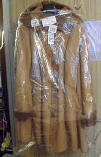 Продаю новое практичное пальто-дублёнку