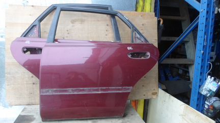 Дверь Мазда 626 ге Mazda GE 626 хетчбэк задняя лев