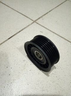 Ролик натяжителя ремня генератора Ford Focus 2009